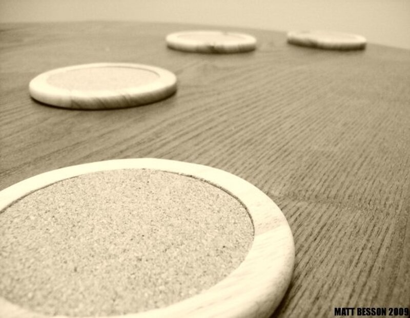 coasters on wooden table