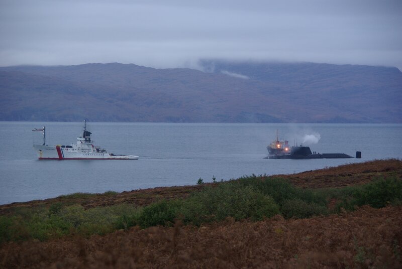 Coastguard and submarine in a bay