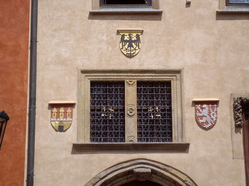 coat of arms on building facade