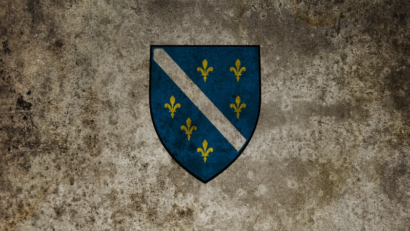 coat of arms on stone wall