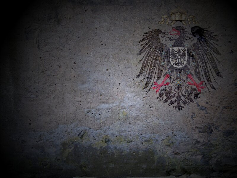 coat of arms on stone wall