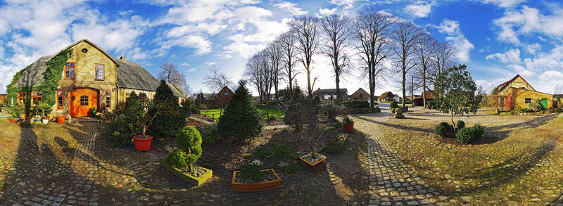 Cobbled Courtyard with House