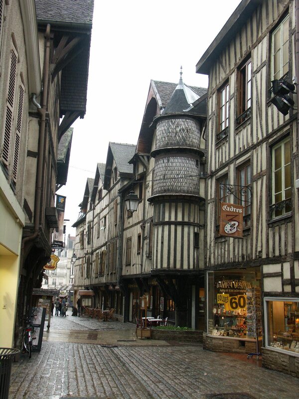 Cobbled street with timber-framed buildings