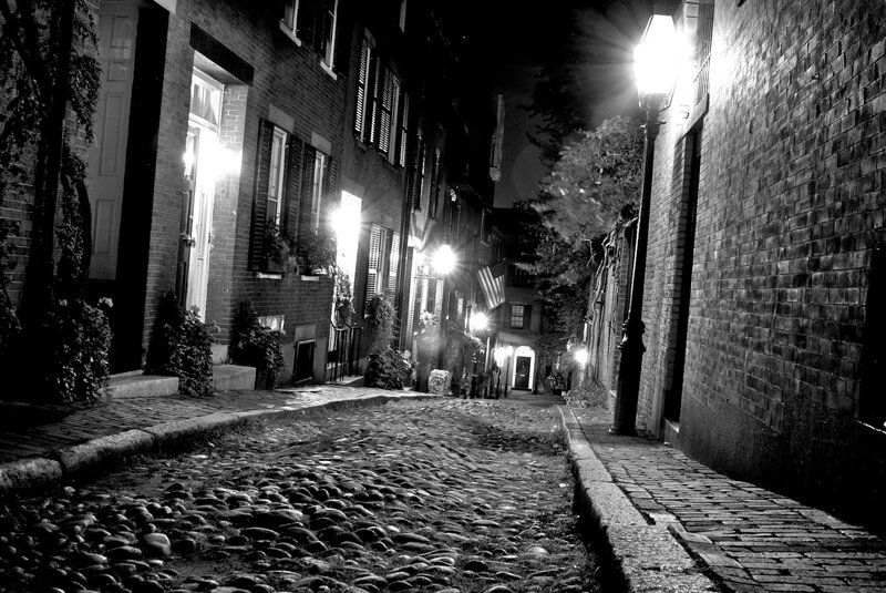Cobblestone alley at night