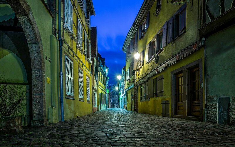 Cobblestone Alley at Night — Yellow, Serene