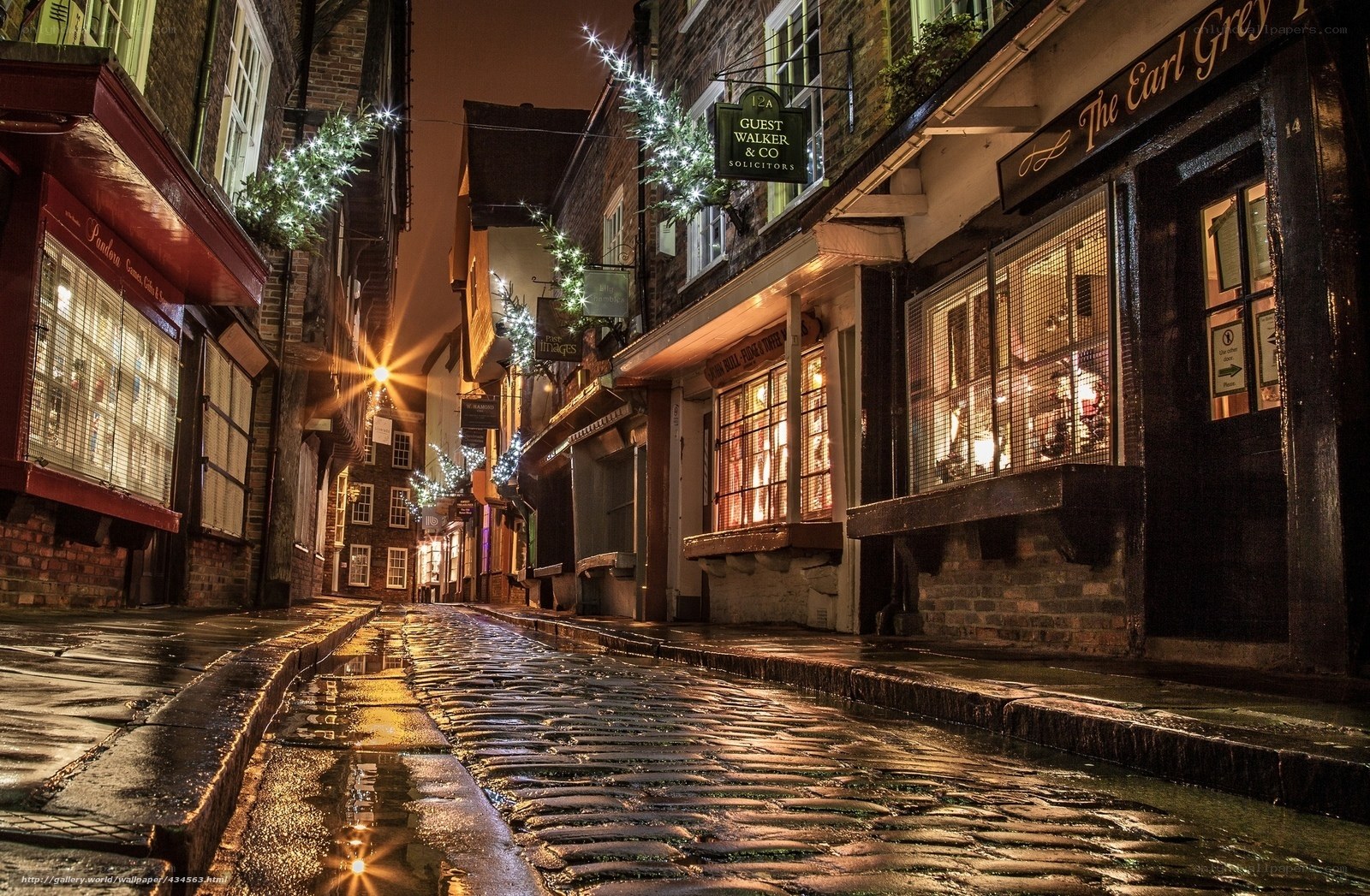 Cobblestone alley at night