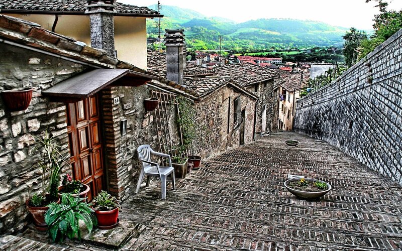 cobblestone alley in a hillside village