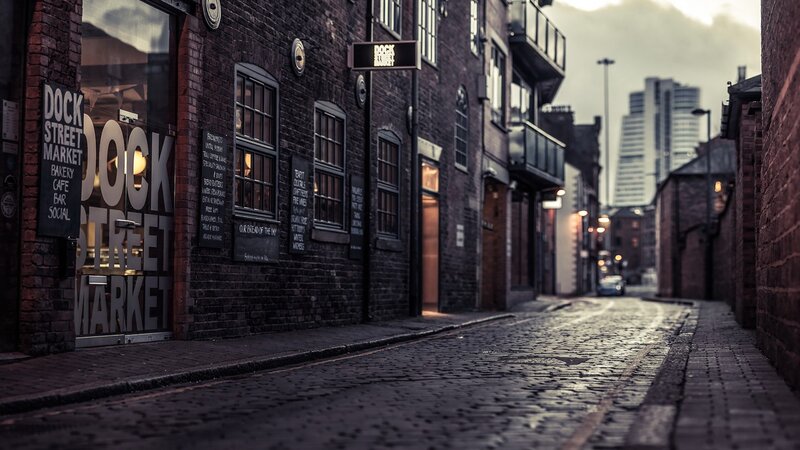 Cobblestone Alley with Brick Buildings — Brown, Dramatic