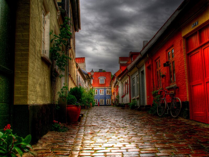 Cobblestone Alley with Buildings — Red