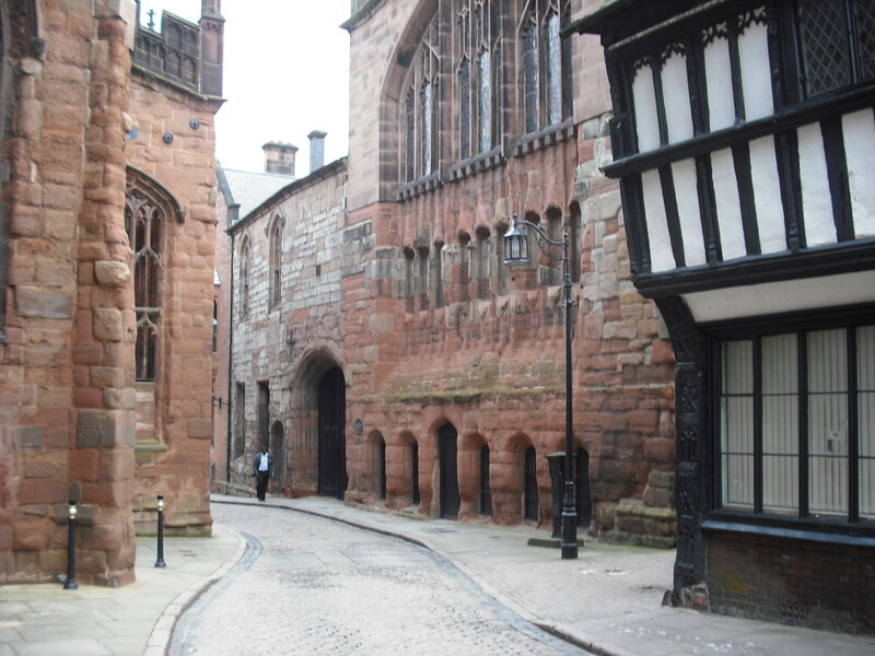 Cobblestone alley with historic buildings