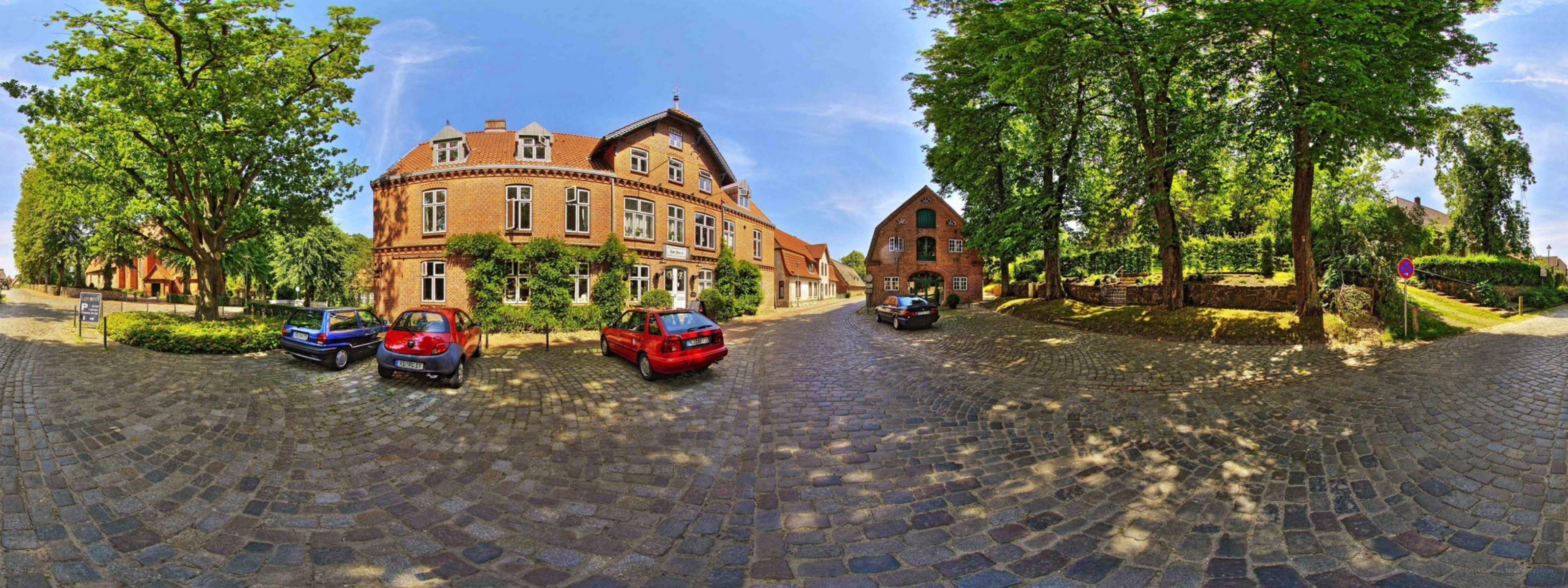 Cobblestone courtyard with historic buildings