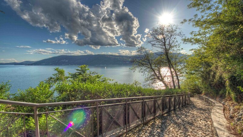Cobblestone Path by Lake — Blue, Serene