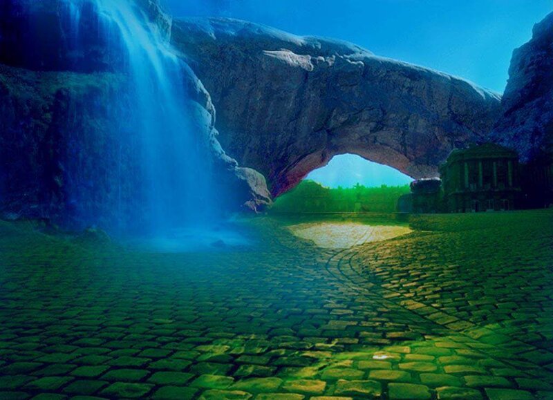 Cobblestone path under a natural arch