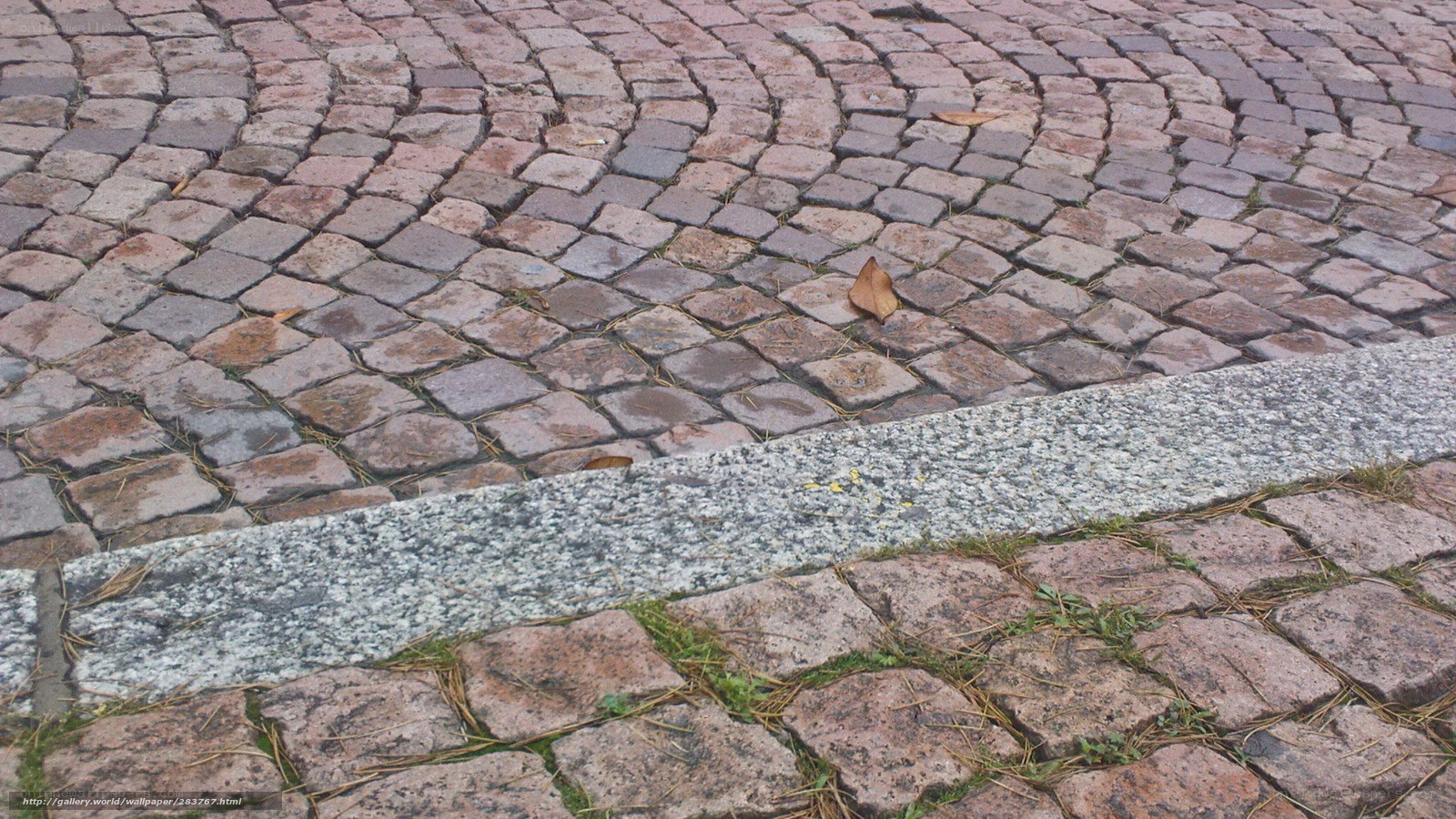 cobblestone pavement with curb