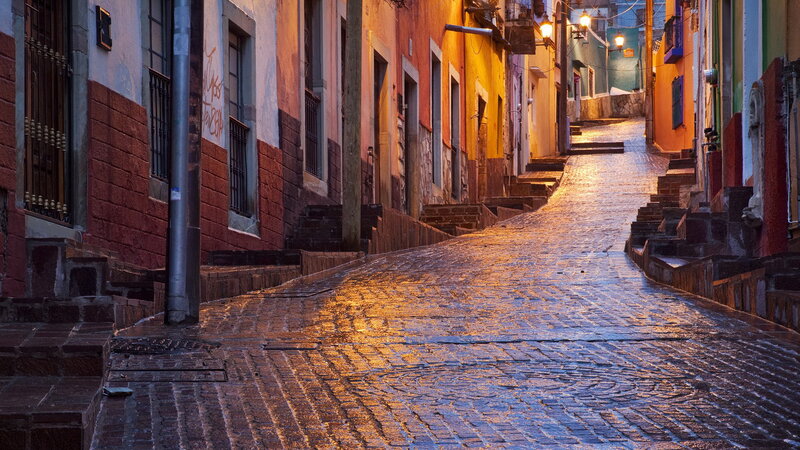 Cobblestone Street at Night — Orange, Serene