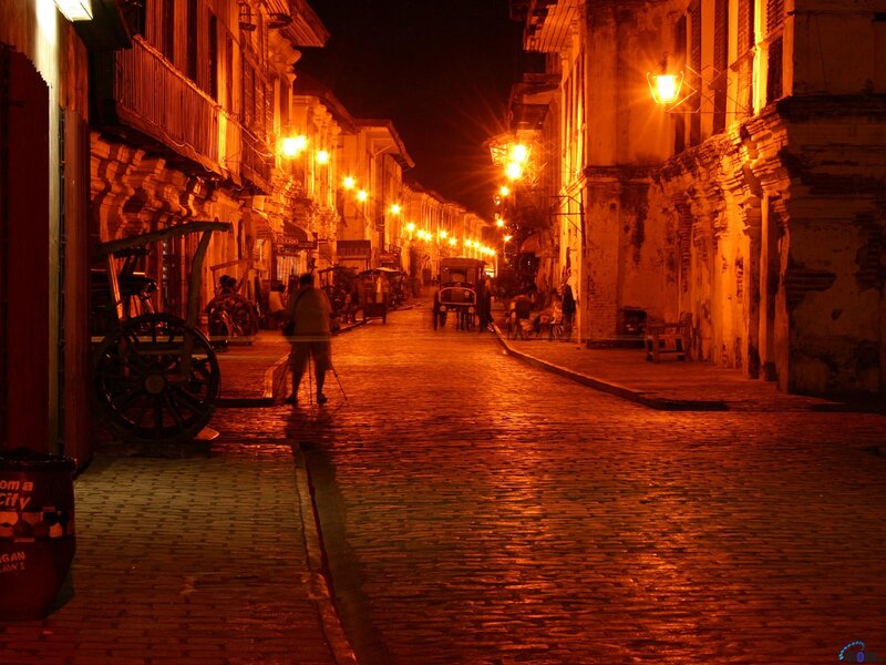 Cobblestone Street at Night — Orange