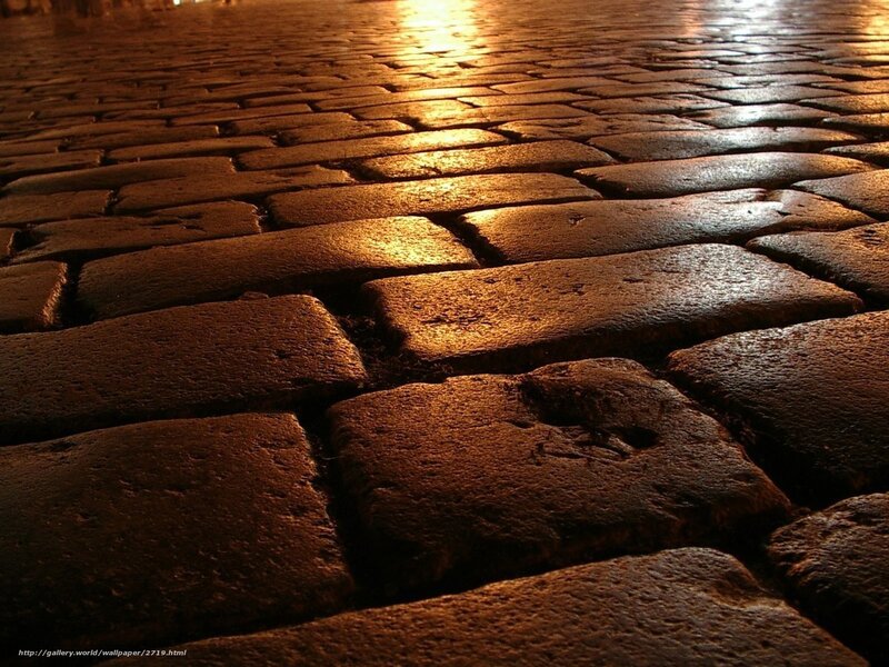 cobblestone street at night
