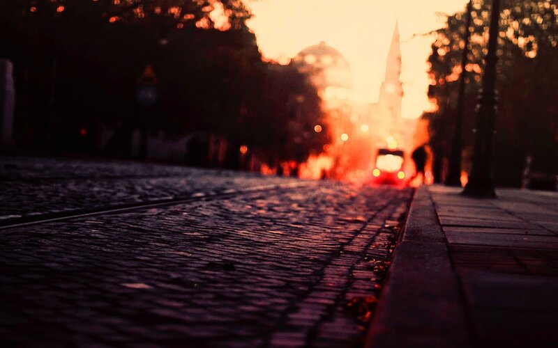 Cobblestone Street at Sunset — Orange, Dramatic