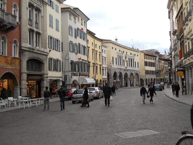 cobblestone street in italian city