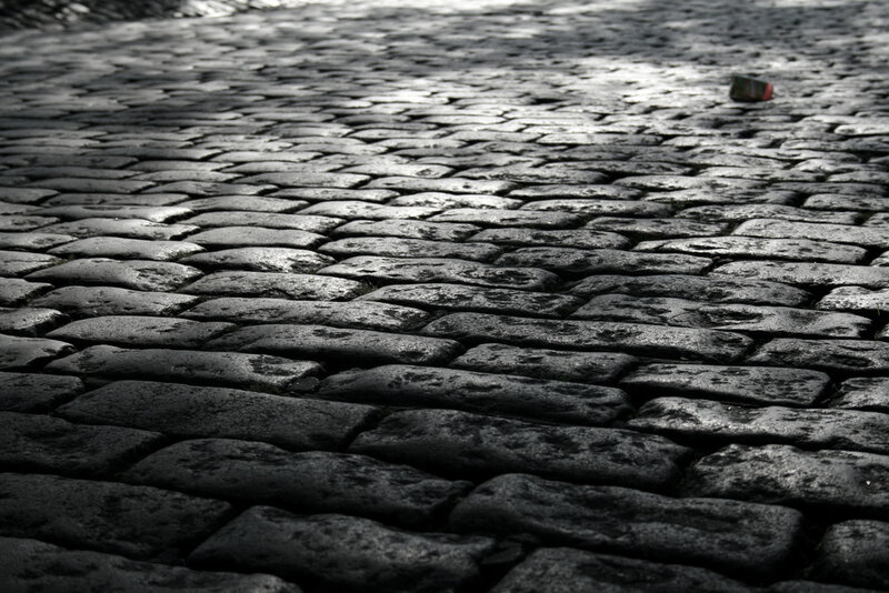 cobblestone street in sunlight