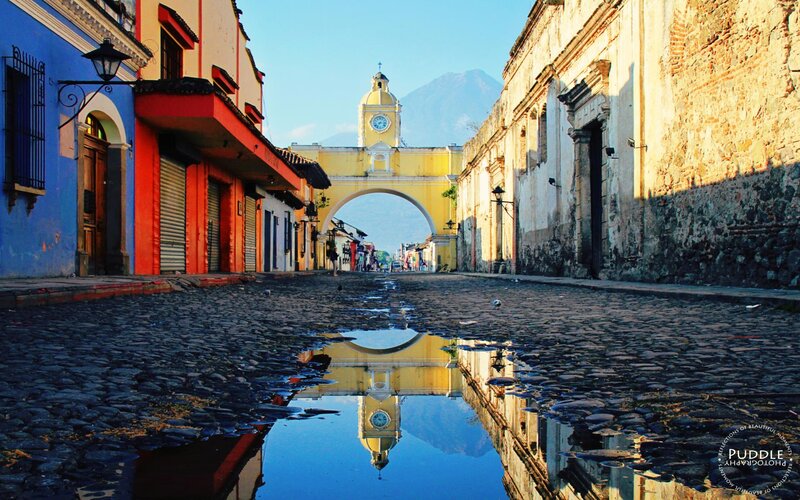 Cobblestone Street with Arch