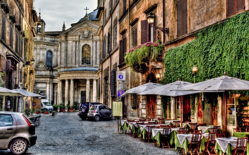 Cobblestone Street with Cafe — Green, Serene
