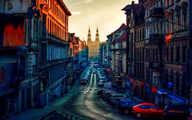 Cobblestone Street with Cars — Orange