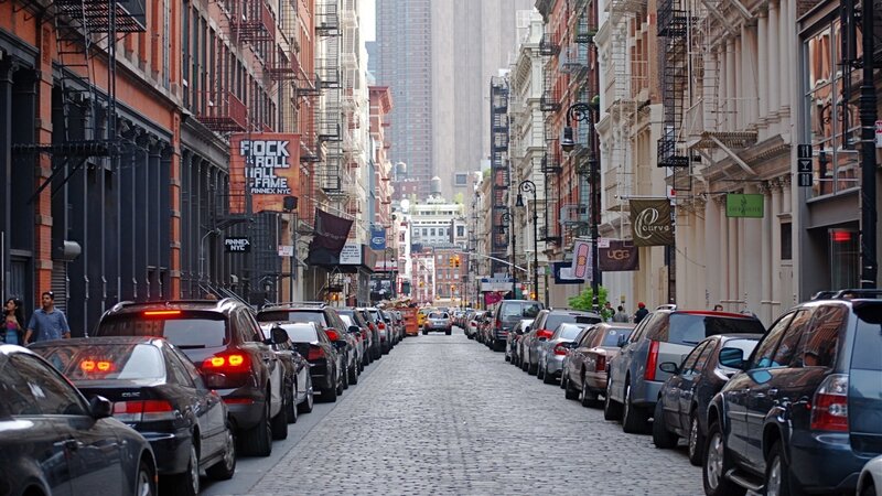 Cobblestone Street with Cars
