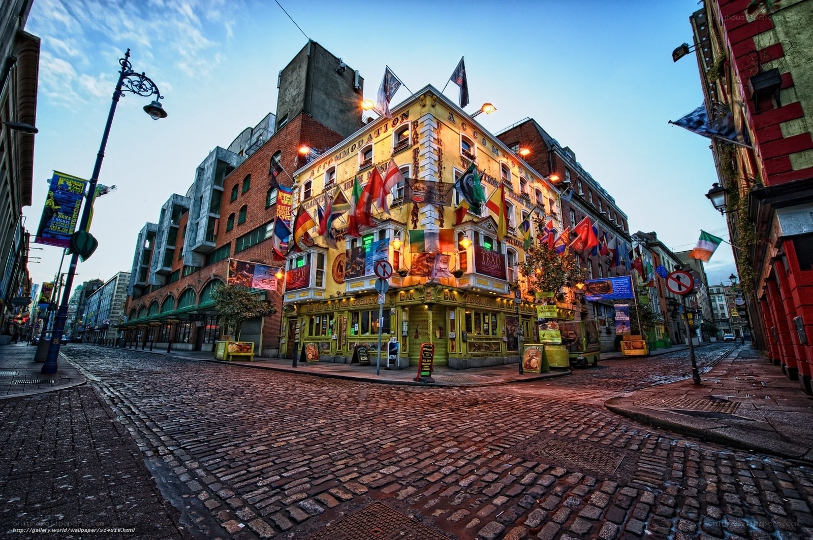 cobblestone street with colorful pub