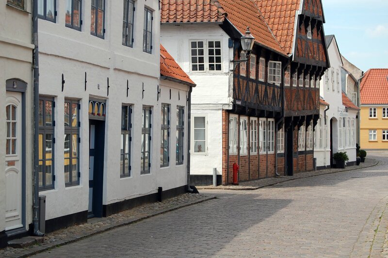 cobblestone street with historic buildings