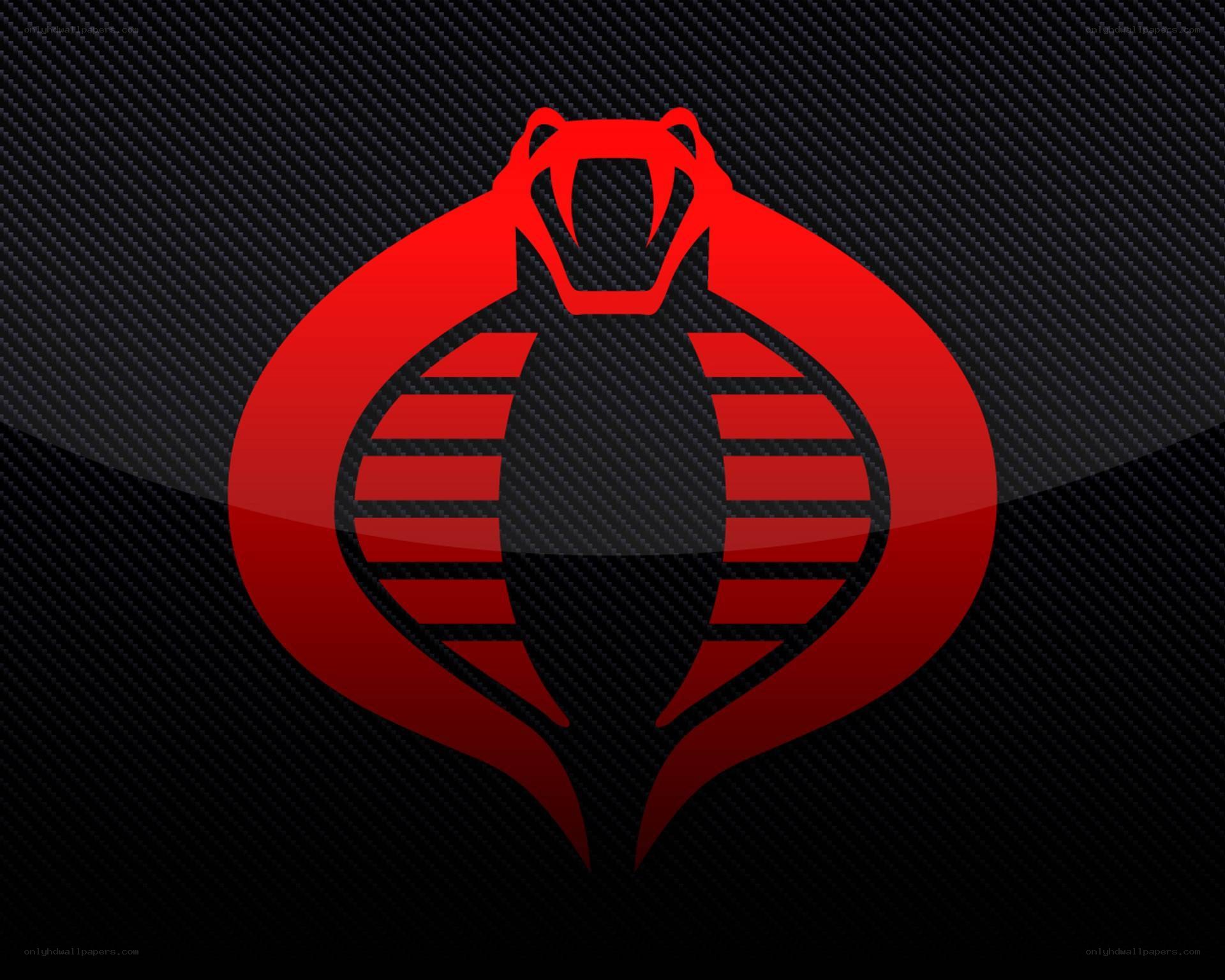 Cobra logo on carbon fiber