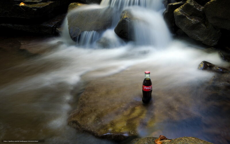 Coca-Cola bottle in a stream