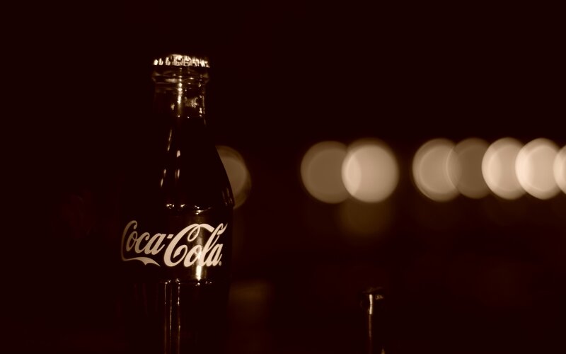 Coca-Cola bottle in dim light