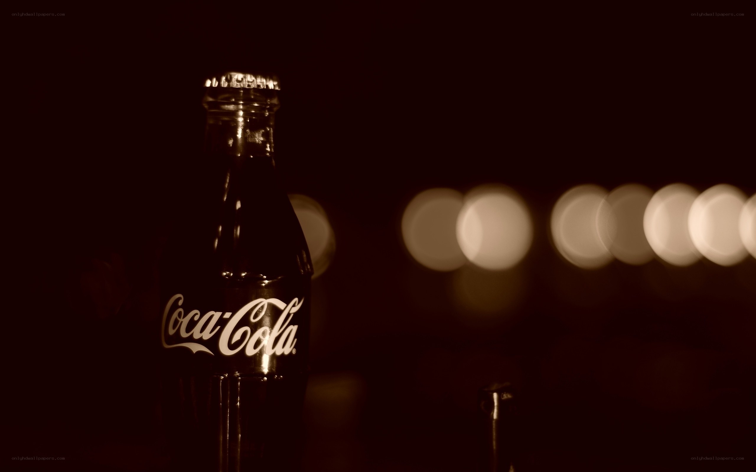 Coca-Cola bottle in dim light
