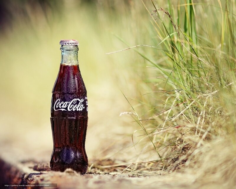 Coca-Cola Bottle in Grass — Brown, Serene