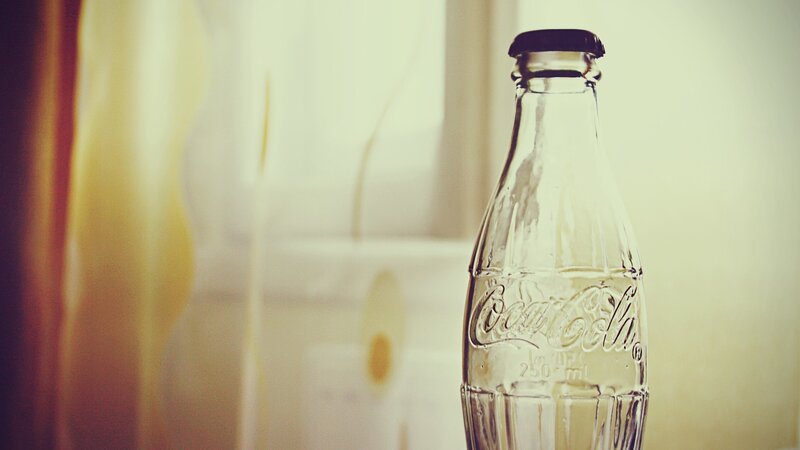 Coca-Cola bottle in soft light
