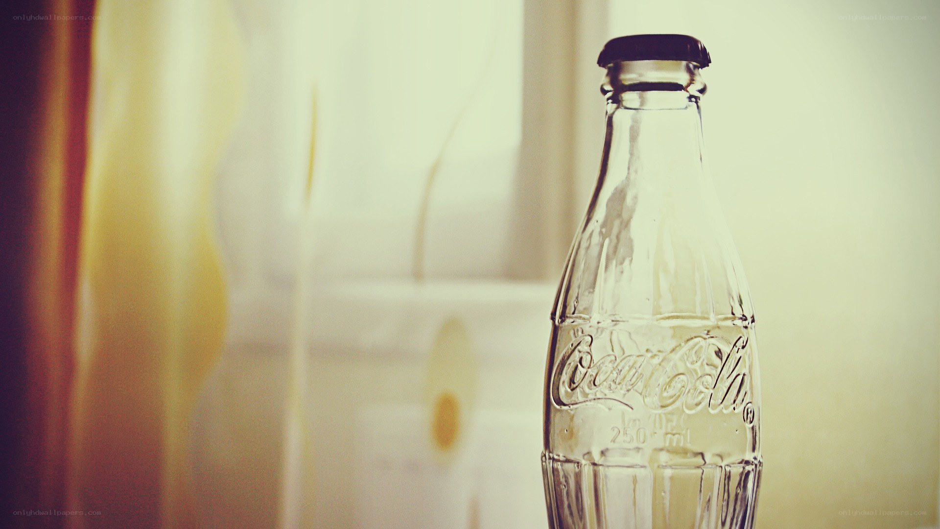 Coca-Cola bottle in soft light