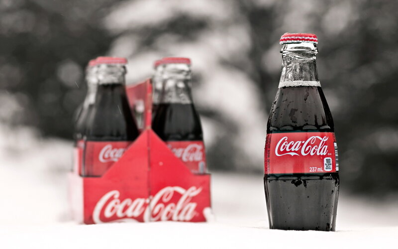 Coca-Cola bottles in snow
