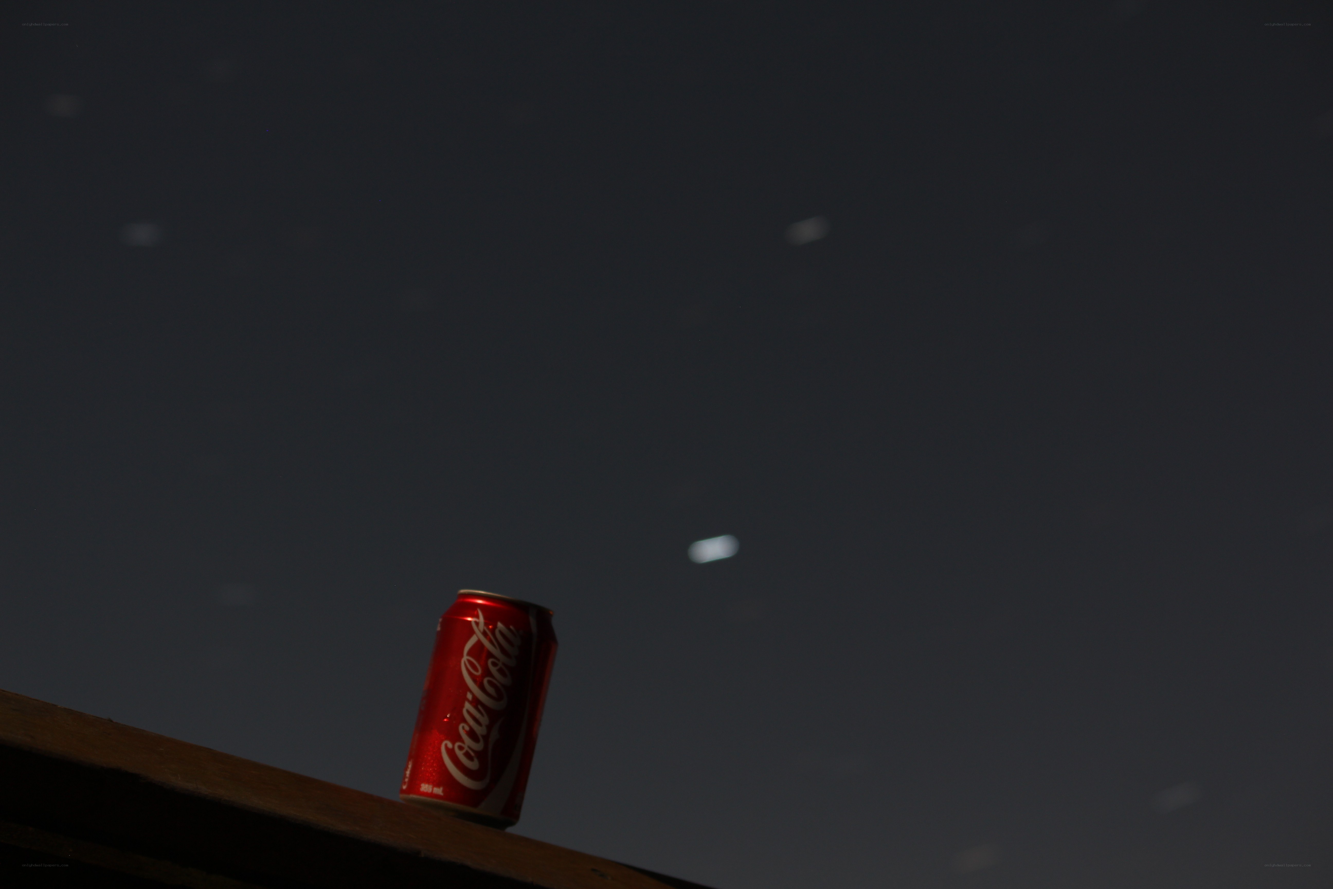 Coca-Cola can at night