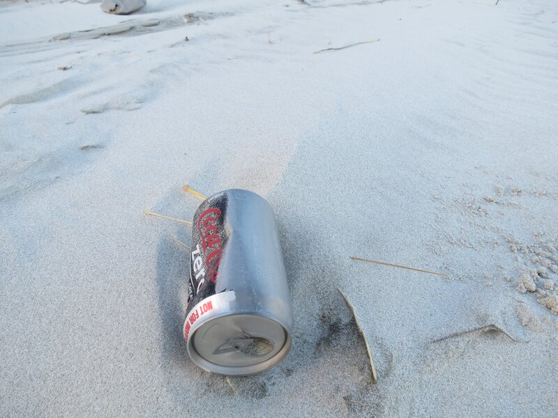 Coca-Cola can on beach
