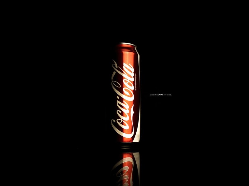 Coca-Cola can on black background