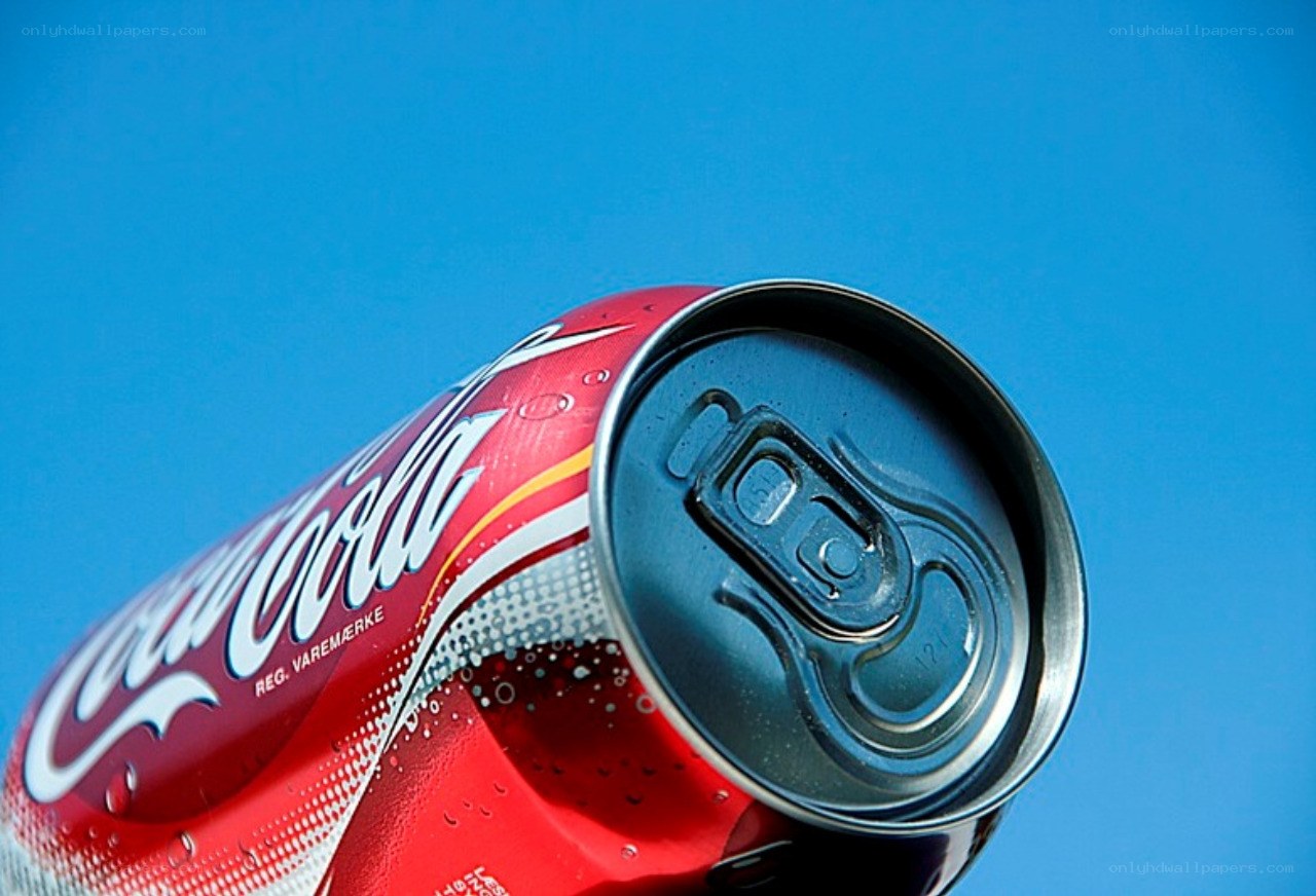 Coca-Cola can on blue background