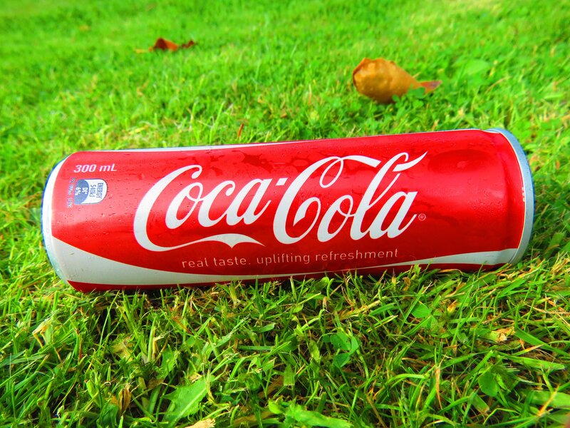 Coca-Cola Can on Grass — Red, Outdoor