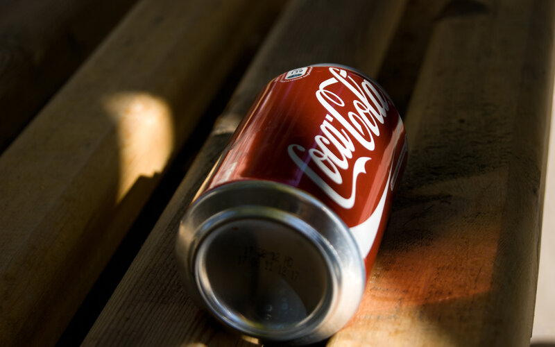 Coca-Cola Can on Wood