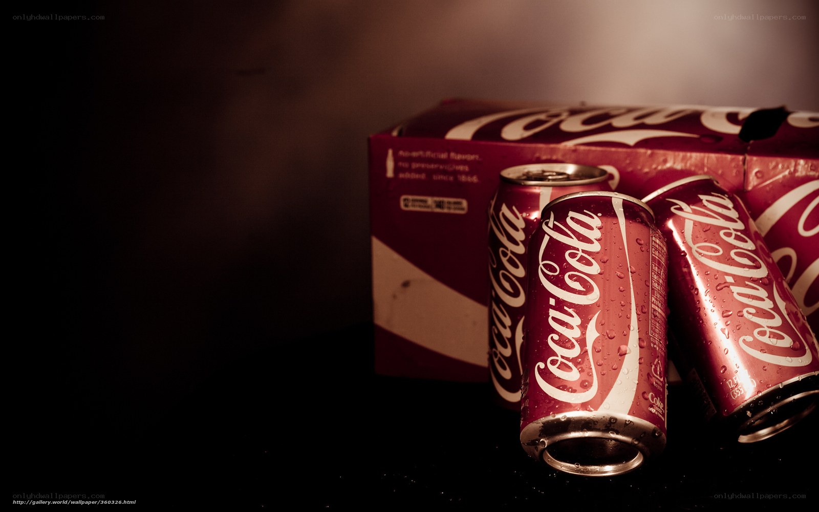 Coca-Cola cans with condensation