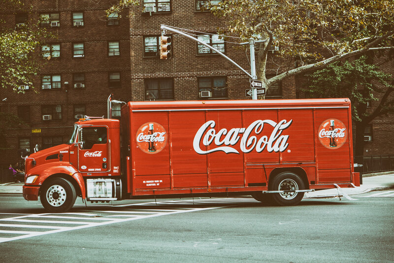 Coca-Cola delivery truck on city street