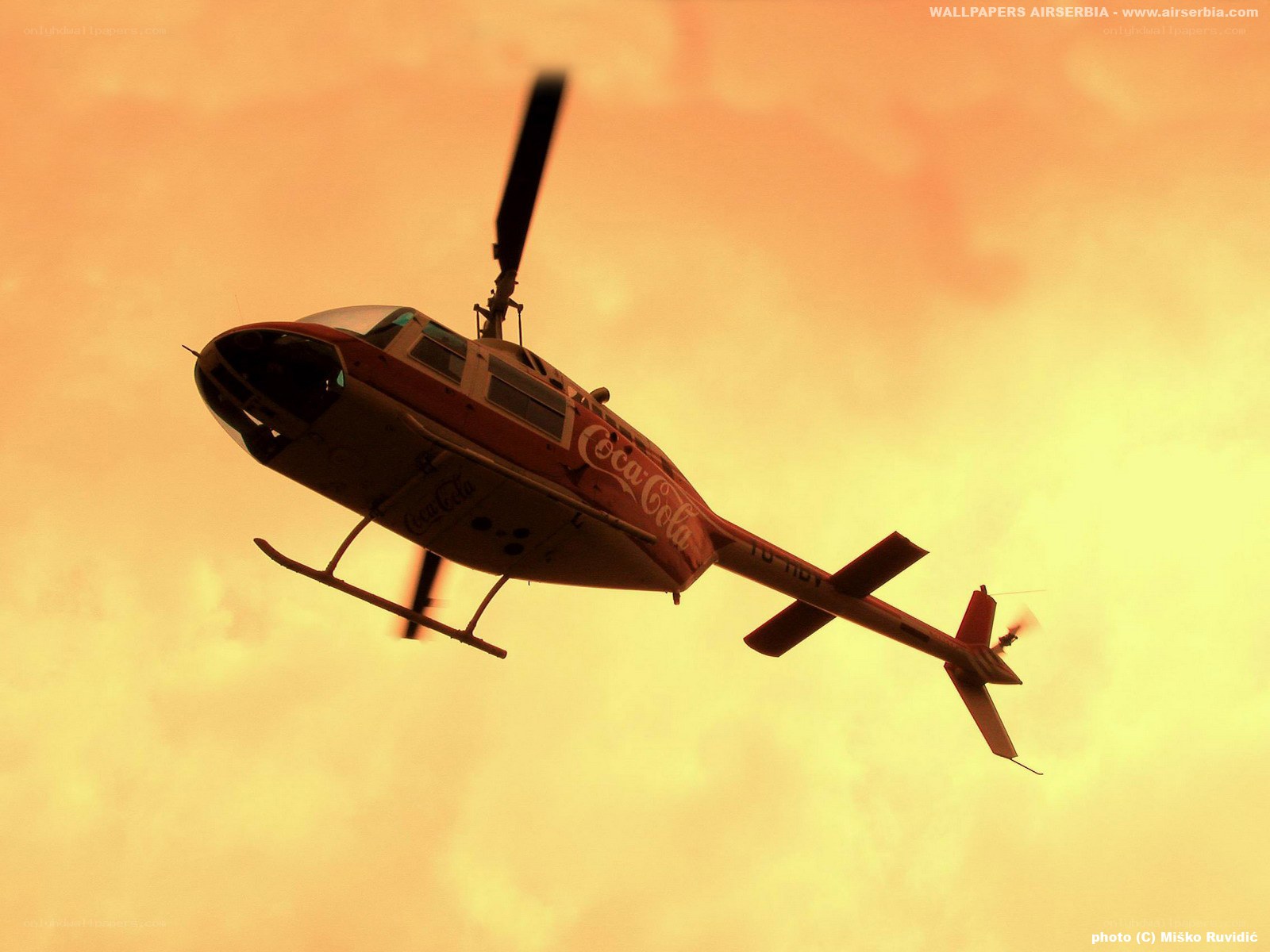Coca-Cola helicopter in flight