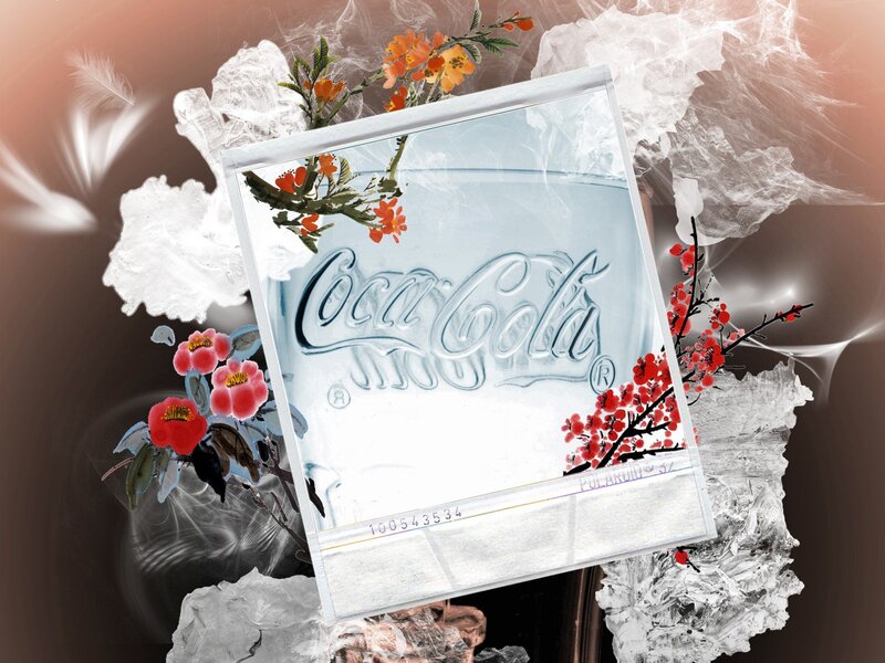 Coca-Cola in ice with flowers