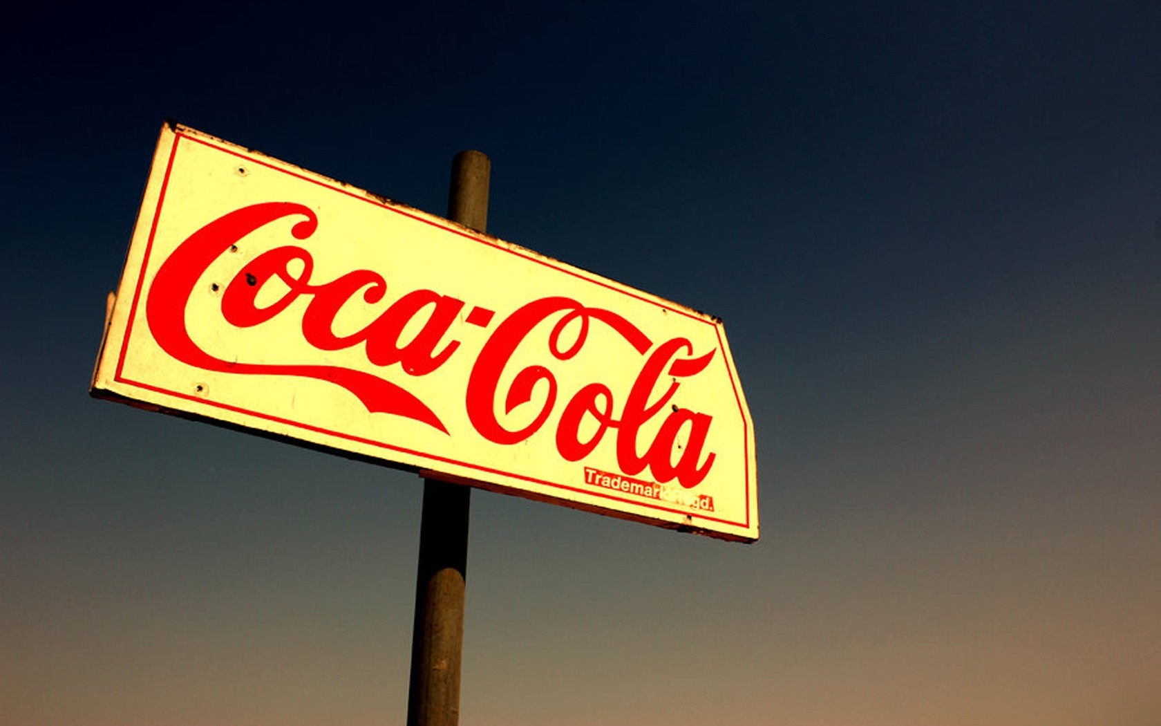 Coca-Cola sign at dusk