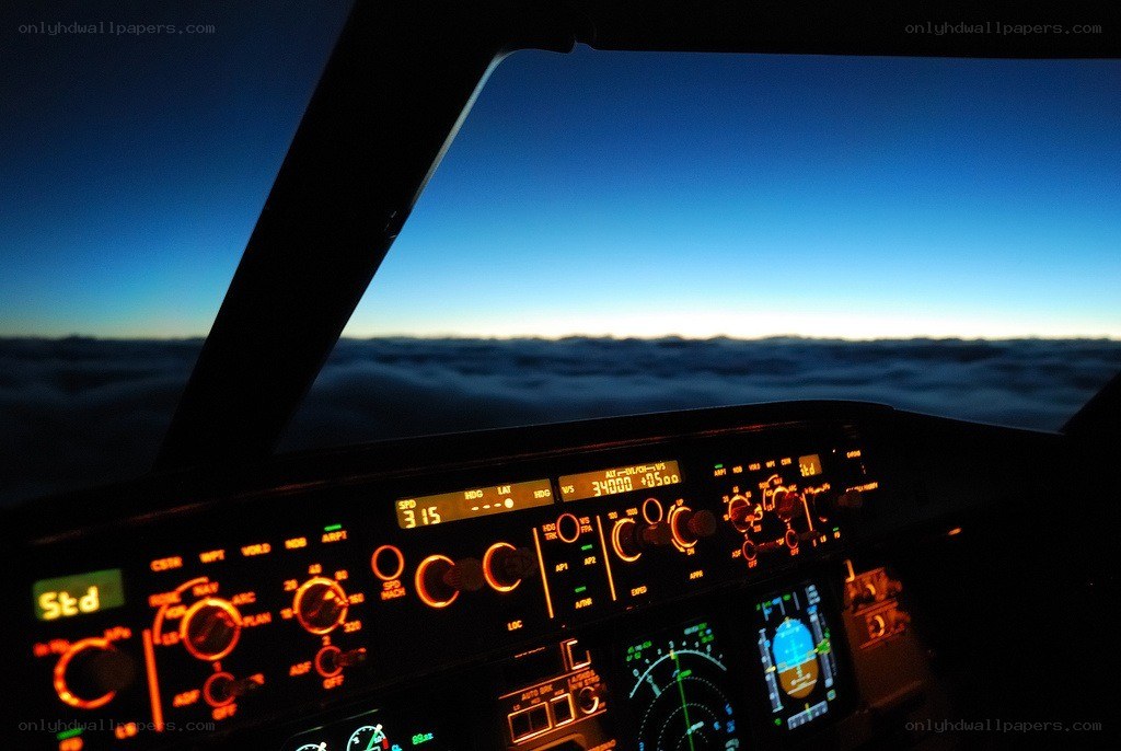 Cockpit view above the clouds